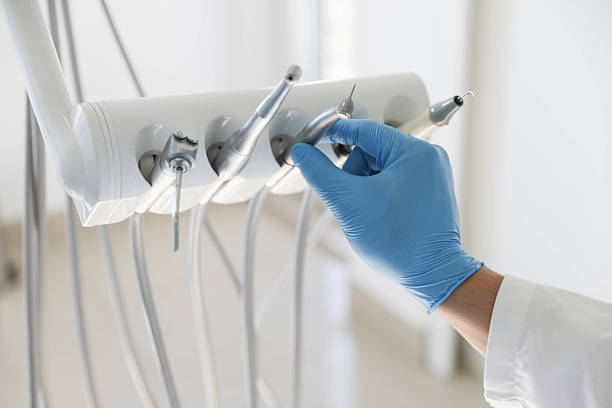 Professional Tooth Extraction technician working in Lafayette Parish County, LA
